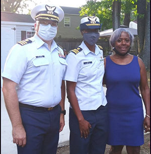 Supervisor Commander Tim Williams,Chanel Lee, and Lee's mom, Betty Jones at the promotion ceremony