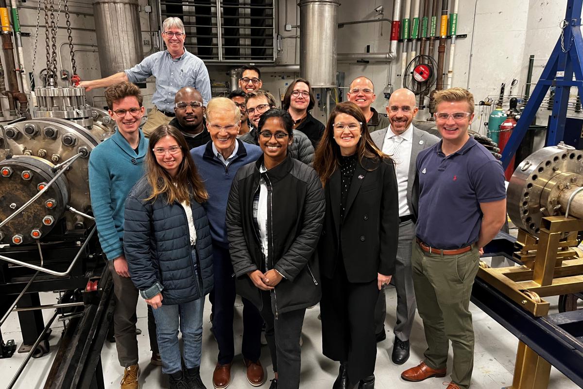 Bill Nelson and NASA guests visit the AE School's research labs