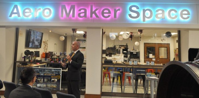 Chair Mark Costello standing in front of the Aero Maker Space