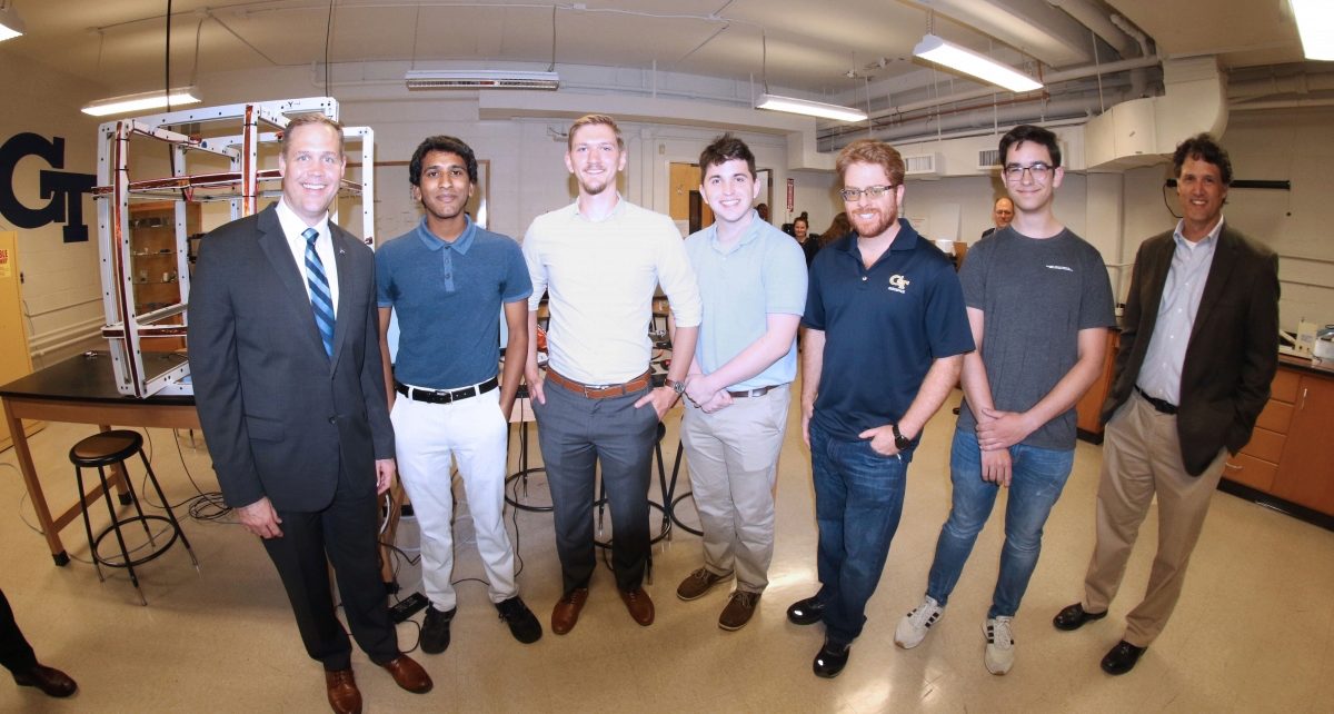 Gunter, far right, Bridenstine, far left, and five research assistants