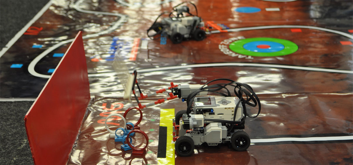 IMEET rovers programmed by high school students attempts to collect rings