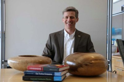 Lieuwen and two of the wood bowls he carves 