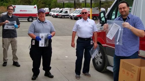 Voluntteers from the Marietta Maker Station delivering masks to the Atlanta Ambulance Service