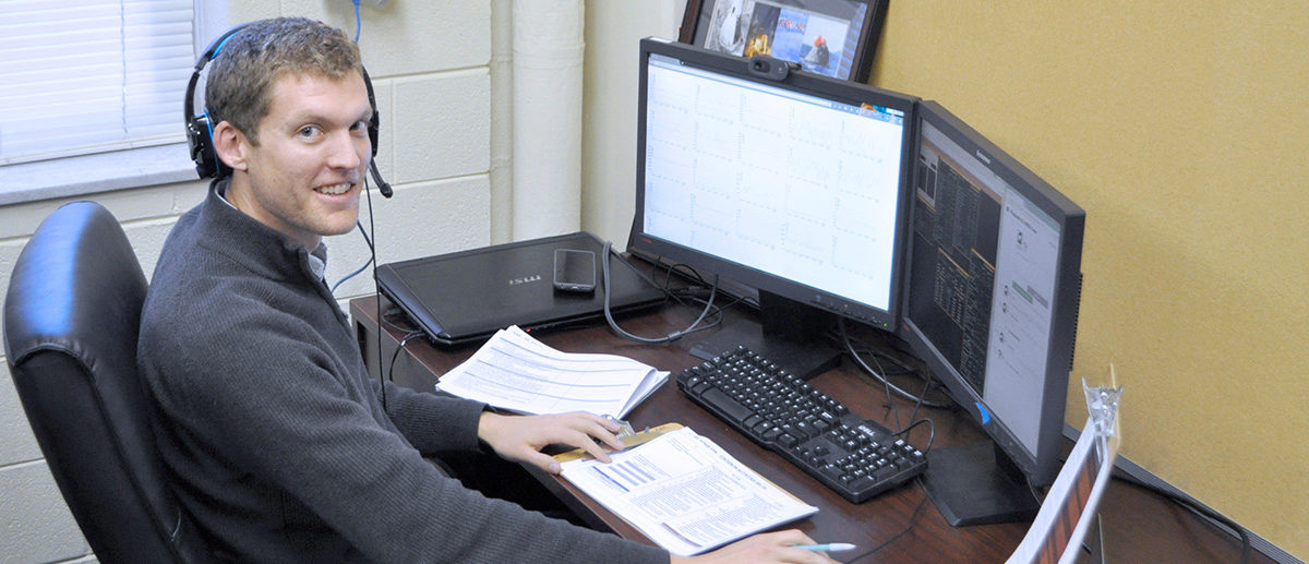 Matthew Miller at a computer