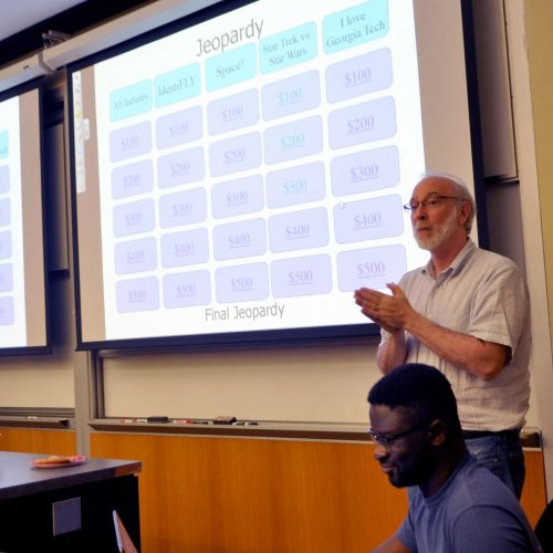 Dr. Seitzman presiding over a game of AE Jeopardy