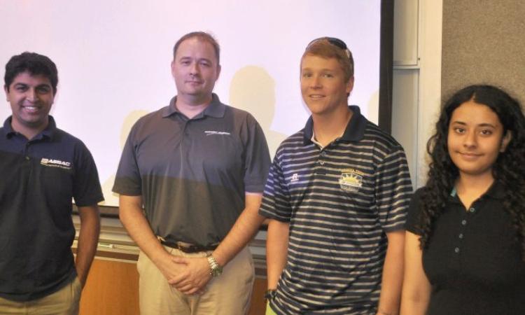 <p>GT grad Dr. Matthew Clark told a capacity crowd of students how they can survive the scariest test of their lives: the six-second resume review. Clark, second from left, is seen here with students from the School of Aerospace Engineering School Advisory Council who sponsored his visit to AE&gt;</p>