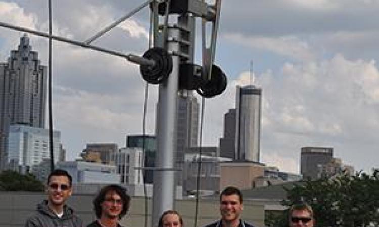 <p><em><strong>The mission control team at Georgia Tech, from left, undergraduates Christopher Pubillones, Nick Zerbonia, Teresa Spinelli, Kevin Okseniuk, and GT-AE Professor David Spencer. Check out <a href="https://www.youtube.com/watch?v=K63So6sn68k">this video</a> of their reactions to the May 20 launch.</strong></em></p>