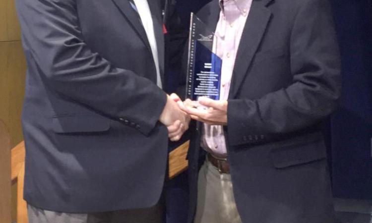 <p>GT-AE professor Robert Braun, right, is seen here with  J. Walt Falconer, executive vice president of the American Astronautical Society</p>