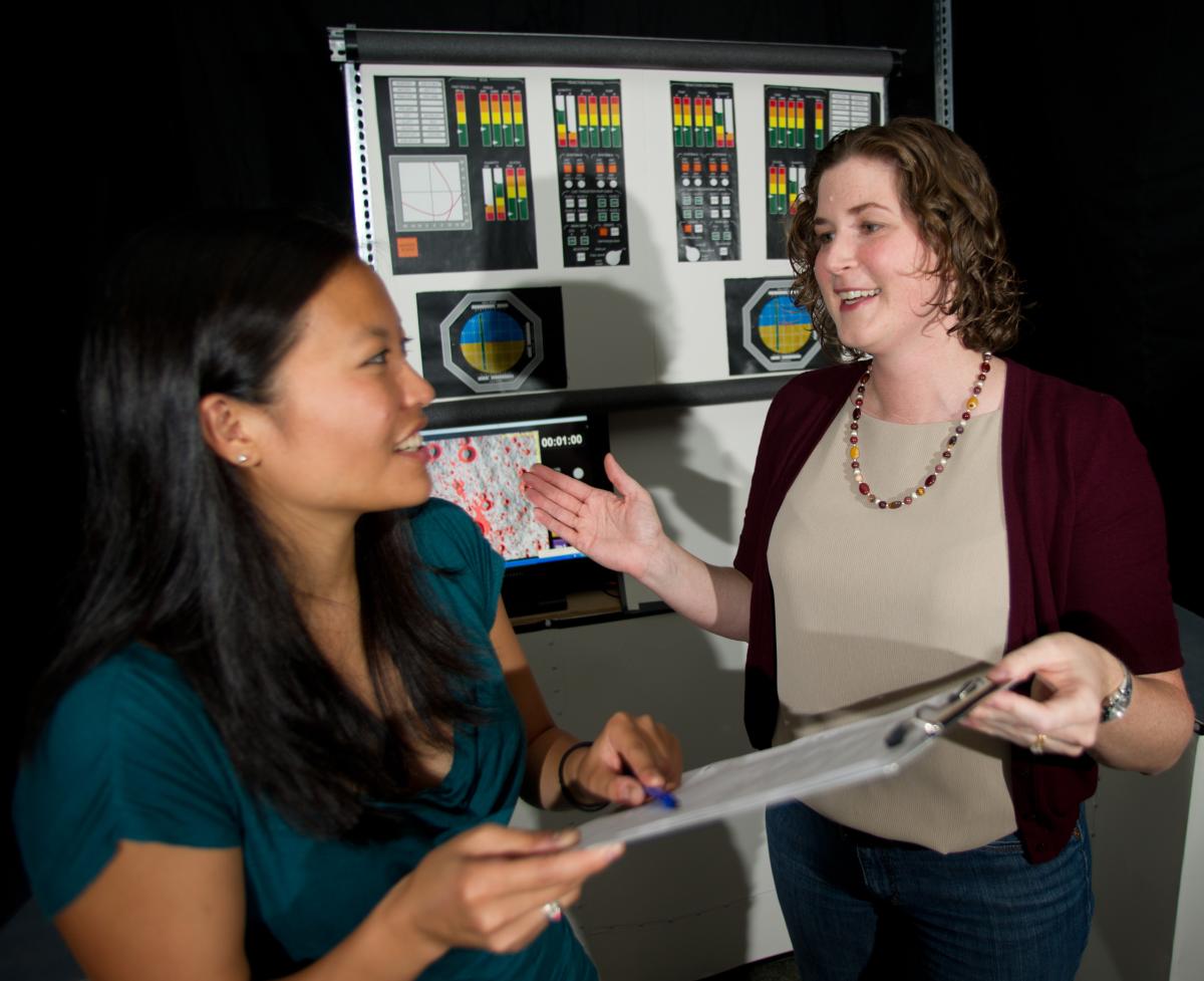 karen feigh discussing research with student