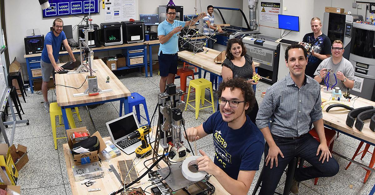 students and faculty in the aero maker space at Georgia Tech