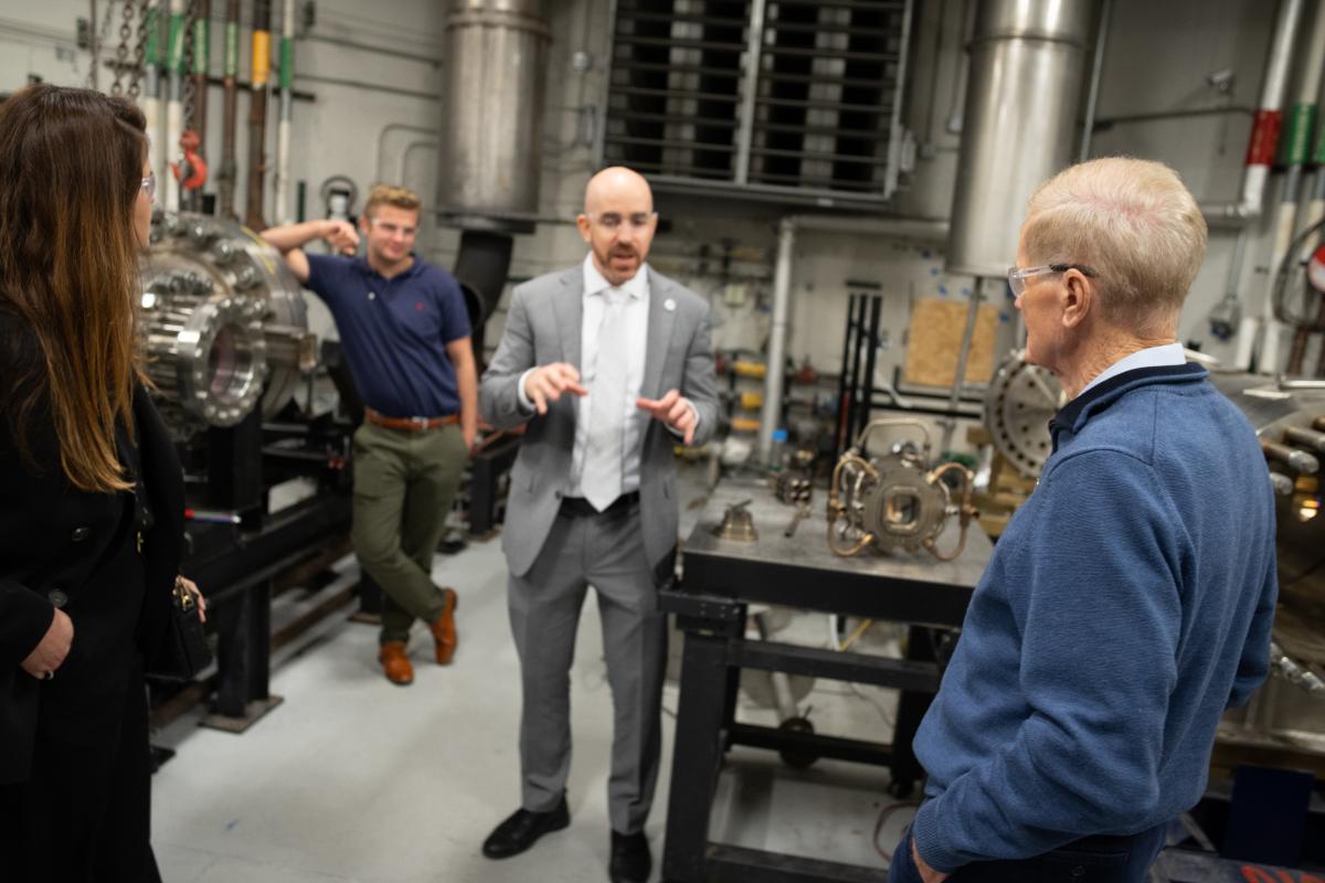 Bill Nelson and NASA guests visit the AE School's research labs