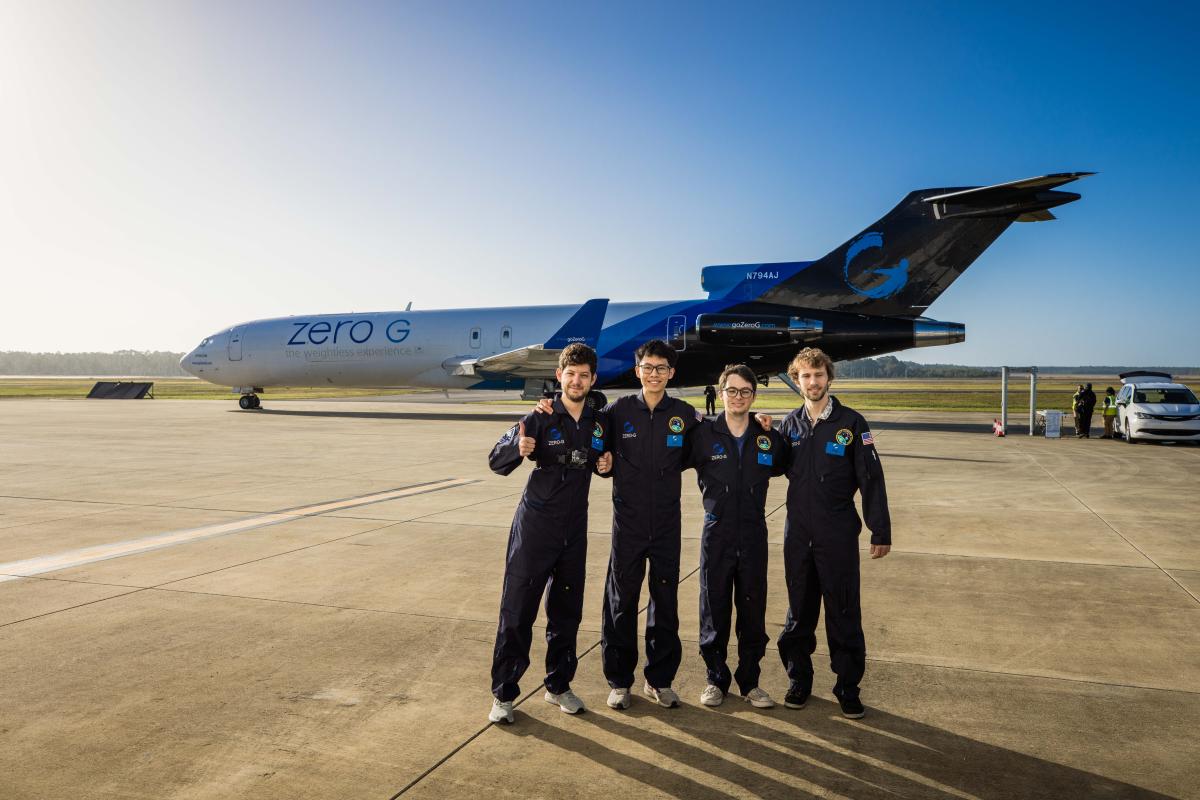 Team from the Space Systems Design Lab get ready to board the modified modified B-727 aircraft to test their PMD.