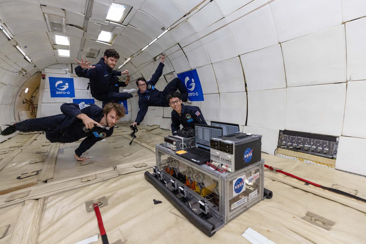 The team experiences micro-gravity while performing their experiment.