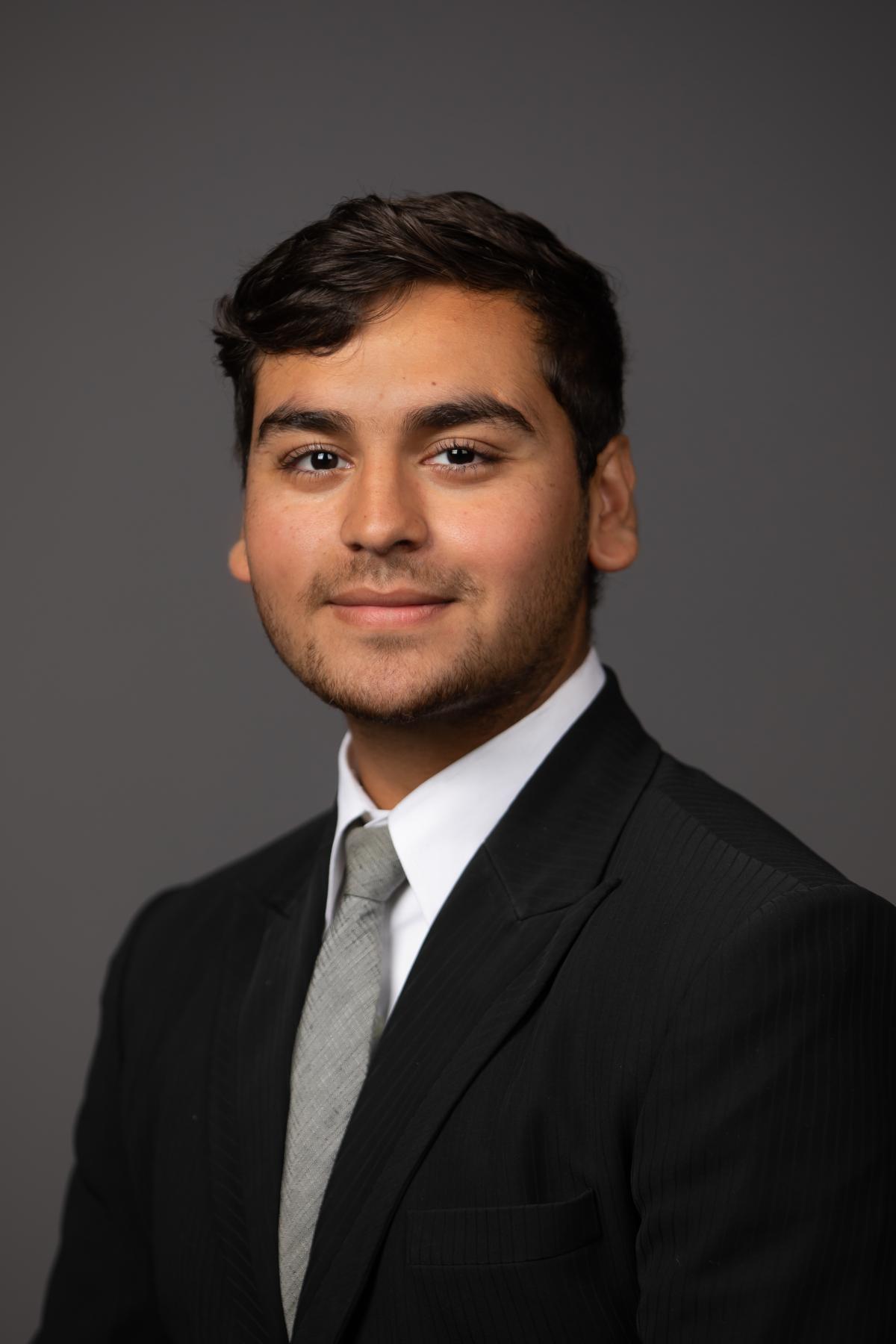 Headshot of Maaz Dossa